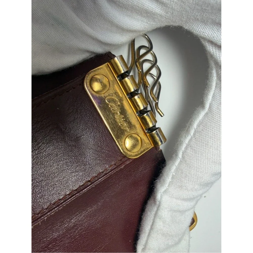Cartier Brownish Red Leather Card Holder with Gold Corner Accents